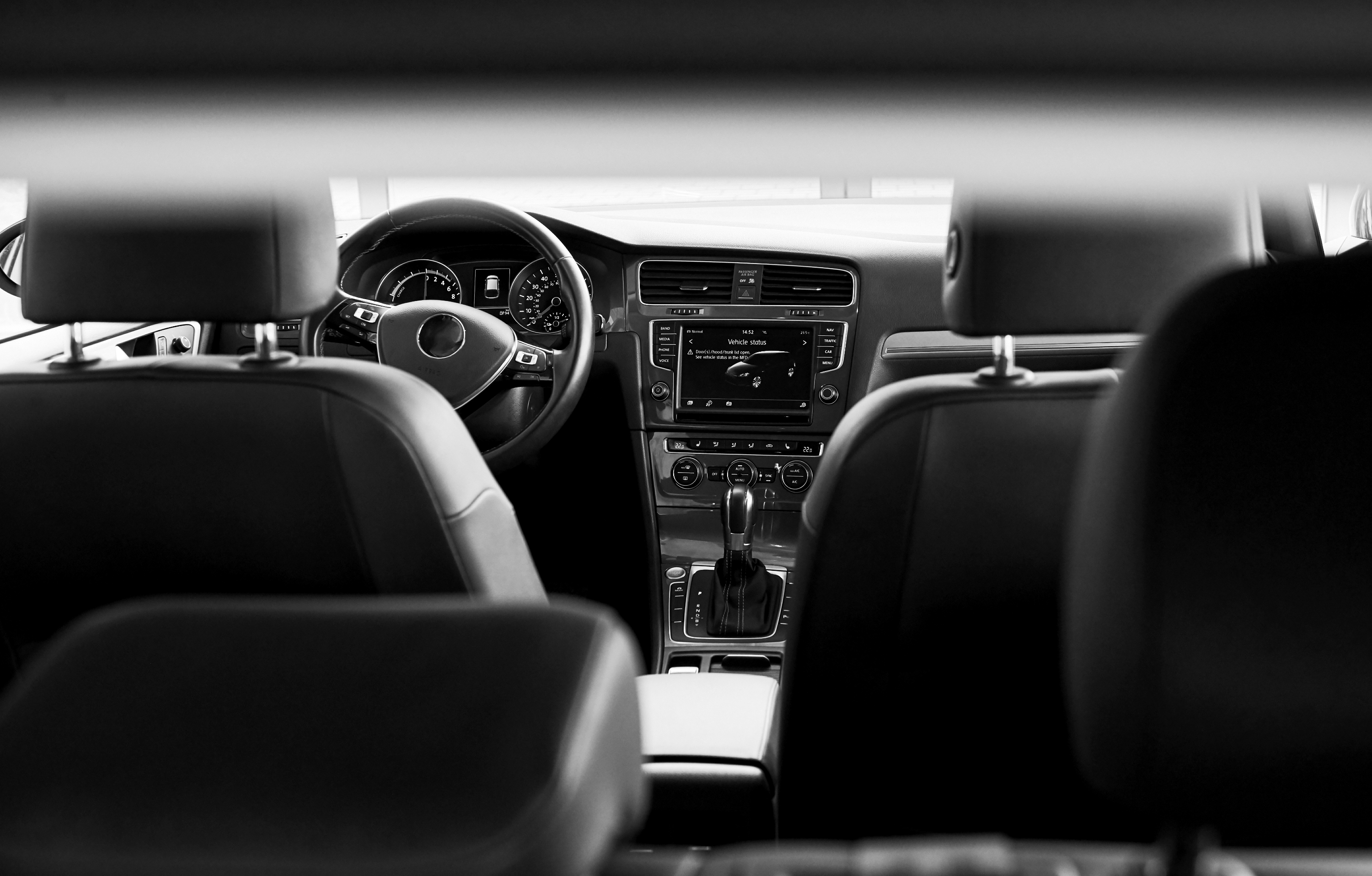 Chauffeur opening the passenger door