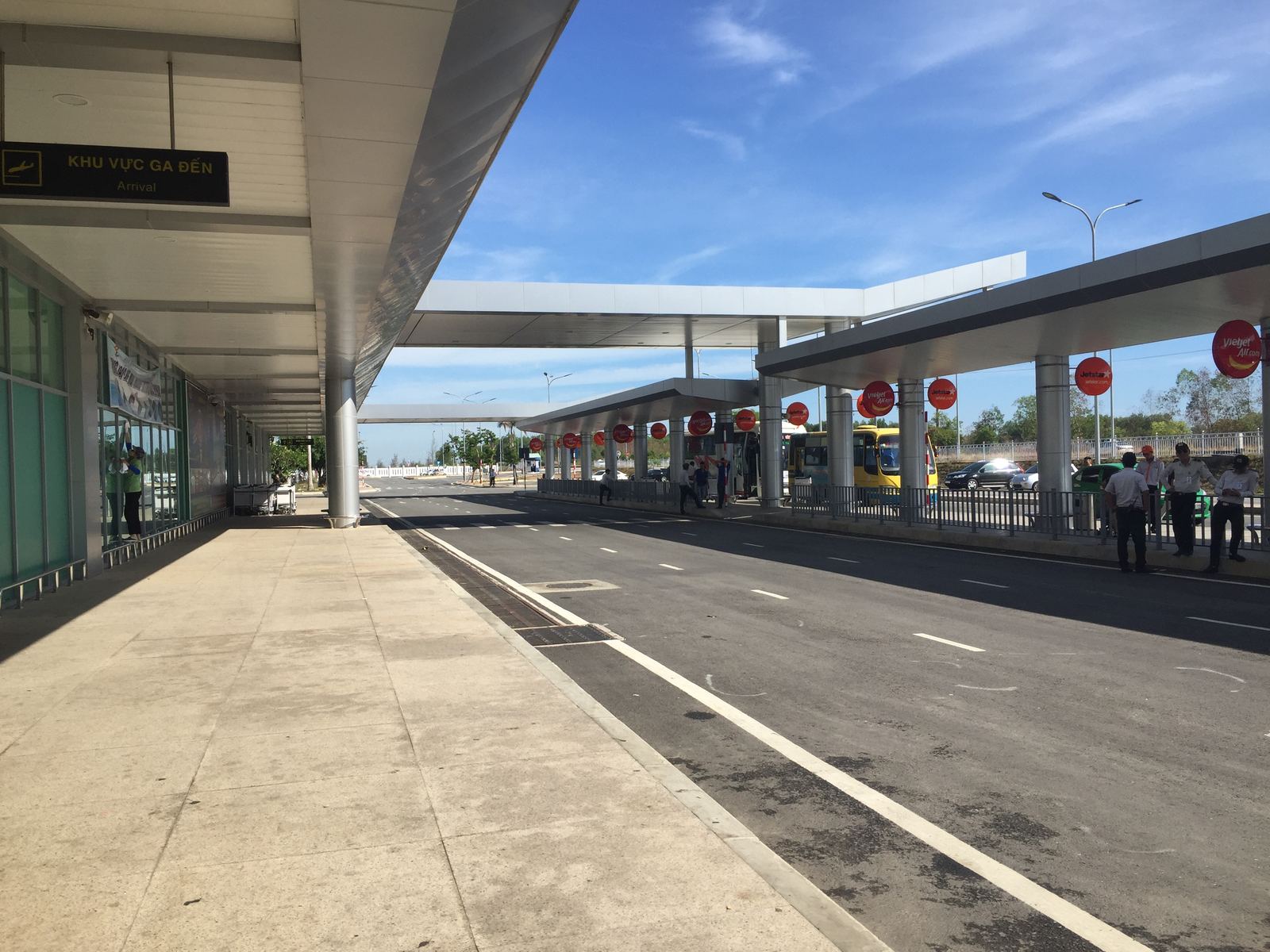 Arrivals hall with travelers and luggage